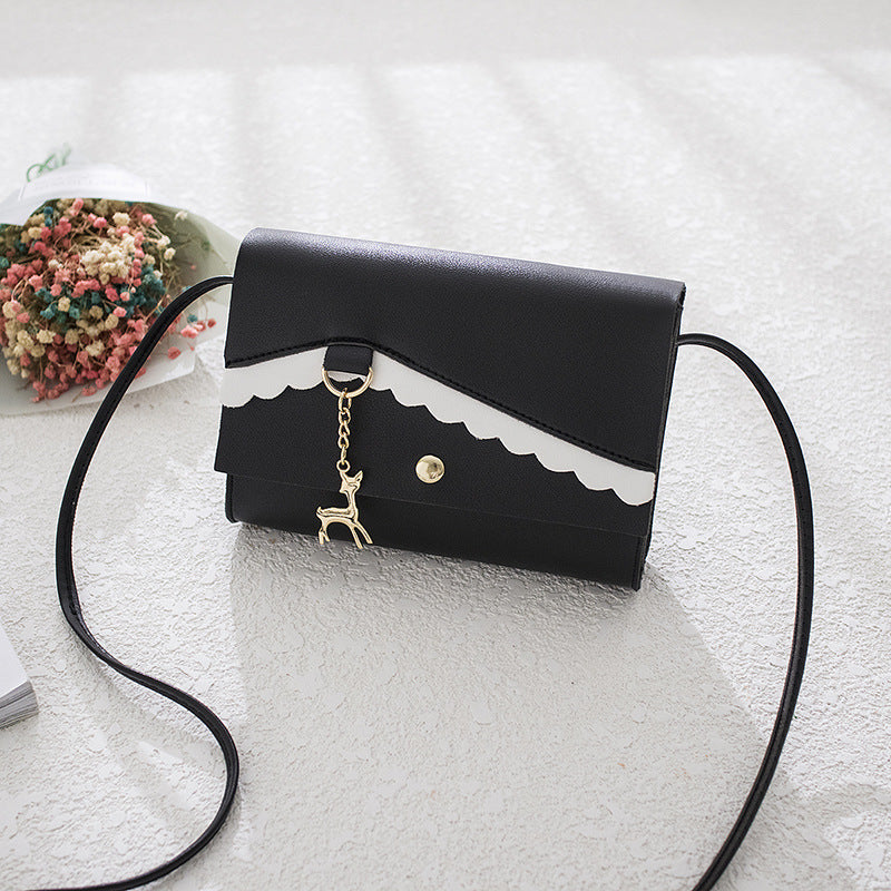 Bolsa com pingente de rena